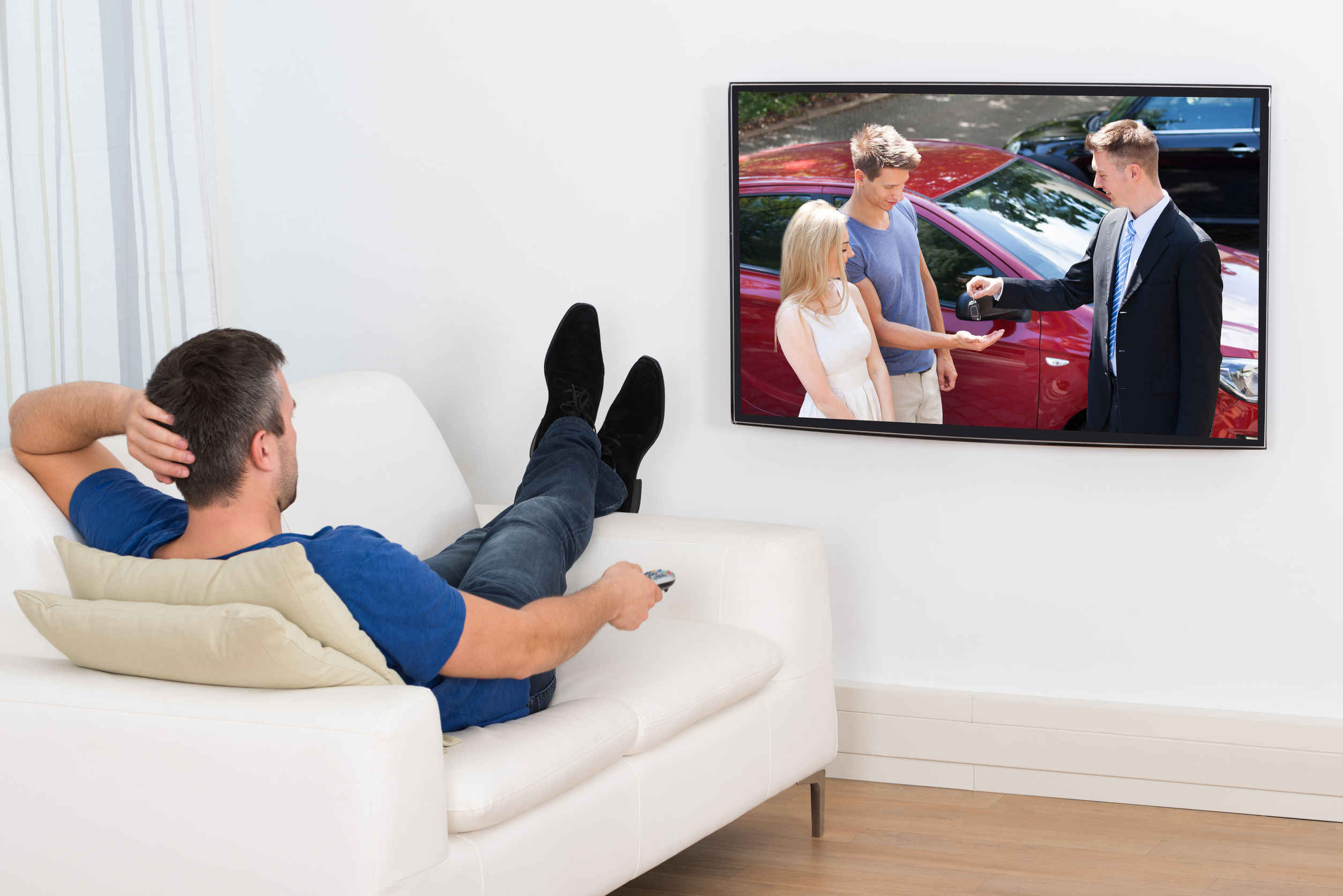 customer_is_watching_hdtv_in_his_living_room